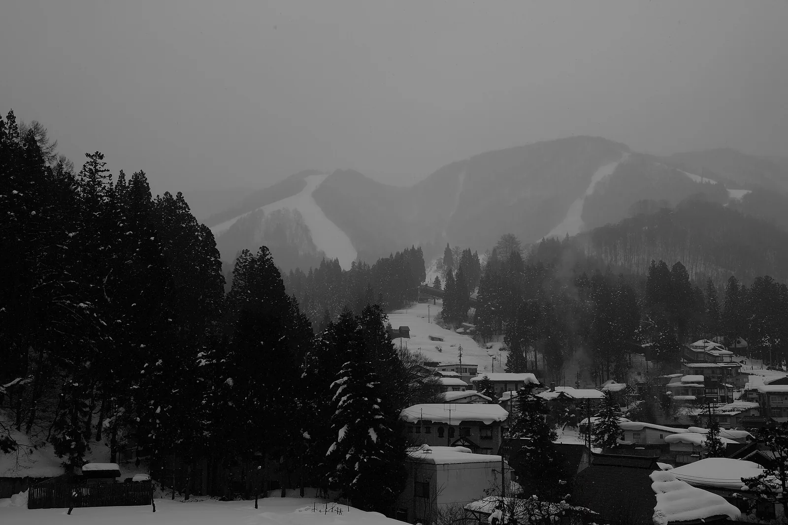 Mount Kenashi above Nozawa Onsen under winter snow